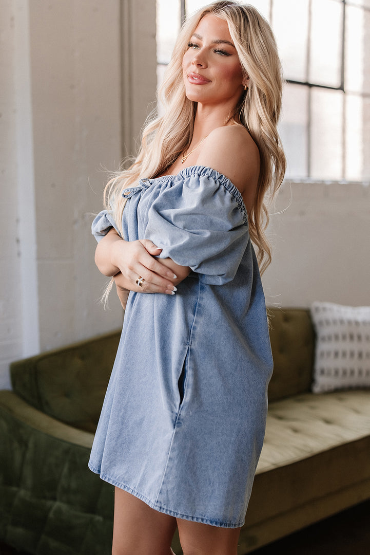 Vestido vaquero con bolsillos y lazo